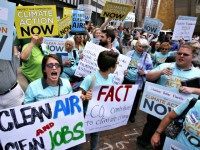 white people rally against climate change ﻿ AP photoGene J. Puskar