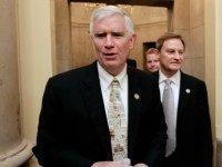 Rep. Mo Brooks, R-Ala., left, and Rep. Spencer Bachus, R-Ala., right, emerge from the Capitol office of House Speaker John Boehner, R-Ohio, as the scheduled vote on his debt plan bill is delayed in Washington, Thursday night, July 28, 2011.