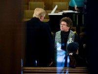 Republican presidential candidate Donald Trump speaks with Rev. Dr. Pamela Saturnia as he arrives for service at First Presbyterian Church in Muscatine, Iowa, Sunday, Jan. 24, 2016. Trump will be holding a rally at Muscatine High School in the afternoon. ()