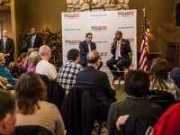 MANCHESTER, IA - JANUARY 31: Republican presidential candidate Ben Carson (R) speaks at a campaign event at Fireside Pub and Steak House on January 31, 2016 in Manchester, Iowa. The Democratic and Republican Iowa Caucuses, the first step in nominating a presidential candidate from each party, will take place on February 1. (Photo by Brendan Hoffman/Getty Images) *** Local Caption *** Ben Carson