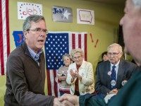 HIAWATHA, IA - JANUARY 31: Republican presidential candidate Jeb Bush greets audience members following a campaign event at his local field office on January 31, 2016 in Hiawatha, Iowa. The Democratic and Republican Iowa Caucuses, the first step in nominating a presidential candidate from each party, will take place on February 1.