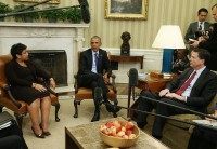 U.S. President Barack Obama speaks about gun control during a meeting with top law enforcement officials, U.S. Attorney General Loretta Lynch And FBI Director James Comey (R) in the Oval Office at the White House January 4, 2016 in Washington, DC. President Obama talked about his options using executive actions on stricter gun control laws. (Photo by)