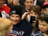 Supporters of the Republican presidential frontrunner Donald Trump try to get autographs after his appearance at the Mississippi Coast Coliseum on January 2, 2016 in Biloxi, Mississippi. Trump, who has strong support from Southern voters, spoke to thousands in the small Mississippi city on the Gulf of Mexico. Trump continues to split the GOP establishment with his populist and controversial views on immigration, muslims and some of his recent comments on women. (Photo by