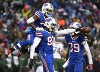 Manny Lawson, Nickell Robey, Mario Butler