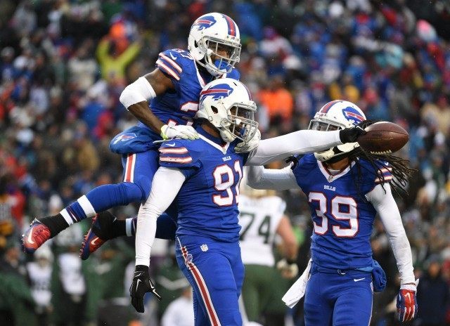 Manny Lawson, Nickell Robey, Mario Butler