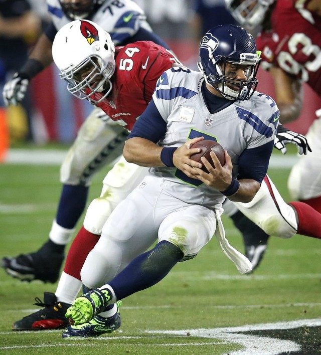 Russell Wilson, Dwight Freeney
