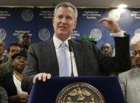 N.Y.C. Mayor de Blasio promises $15 minimum wage for city workers by end of 2018