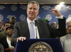 N.Y.C. Mayor de Blasio promises $15 minimum wage for city workers by end of 2018