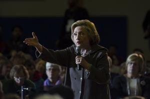 Clinton heckled about husband's sex scandals at NH town hall meeting