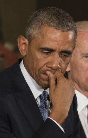 Armed protesters to descend on Obama town hall gun meeting