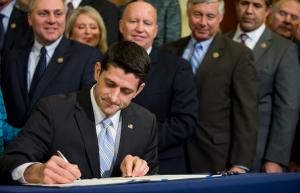 Ryan signs first Obamacare repeal to reach White House