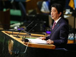 Japan's Abe calls for summit with Putin over Pacific islands