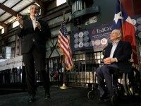 Republican presidential candidate, Sen. Ted Cruz, R-Texas, accompanied by Texas Gov. Greg Abbott, speaks during a rally, Wednesday, Feb. 24, 2016, in Houston.
