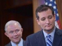 Senator Ted Cruz (R), R-TX, and Senator Jeff Sessions (L), R-AL, appear at a press conference on immigration in the Senate Studio of the US Capitol on September 9, 2014 in Washington, DC.
