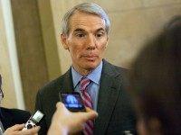 WASHINGTON, DC - DECEMBER 20: Senator Rob Portman (R-OH) speaks with reporters outside of Speaker John Boehner's office, on Capitol Hill, December 20, 2012 in Washington, DC. House Republicans called off plans to vote on Boehner's "Plan B" Fiscal Cliff plan. (Drew Angerer/Getty Images)