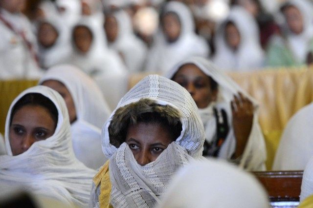 Christian orthodox women attend Christmas midnight mass led by newly elected leader of Egypt's Coptic Christian, Pope Tawadros II, Head of the Egyptian Coptic Orthodox Church, at the al-Abasseya Cathedral in Cairo