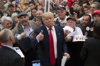 MYRTLE BEACH, SC - FEBRUARY 19: Republican presidential candidate Donald Trump gestures to photographers at a rally February 19, 2016 in Myrtle Beach, South Carolina. Trump is campaigning throughout South Carolina ahead of the state's primary.  (Photo by Aaron P. Bernstein/Getty Images)