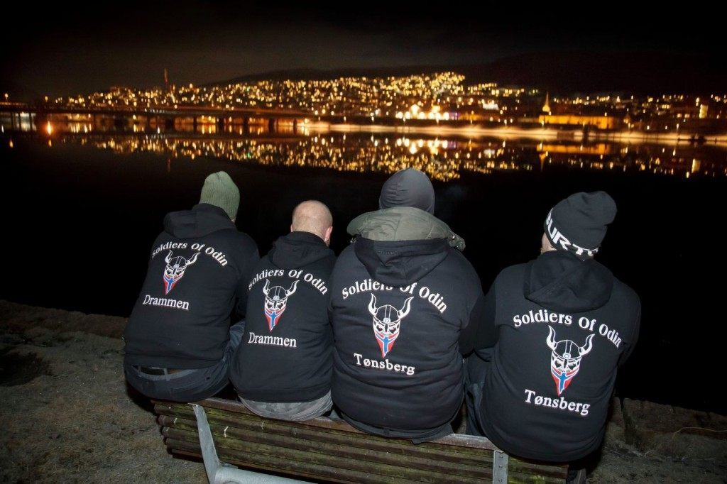 Members of the so-called "Soldiers of Odin" volunteer street patrol are pictured as they patrol through the streets of Drammen, Norway, on Sunday night, February 21, 2016. / AFP / NTB Scanpix / Heiko JUNGE / Norway OUT (Photo credit should read HEIKO JUNGE/AFP/Getty Images)