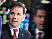 Republican presidential candidate, Sen. Marco Rubio, R-Fla., talks to CNBC correspondent John Harwood, left, during an interview at the New York Stock Exchange in New York, Monday, Oct. 5, 2015. (AP Photo/Mark Lennihan)