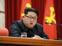 North Korean leader Kim Jong-Un delivering a speech at a national awards ceremony for nuclear scientists