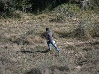 An undocumented immigrant runs from U.S. Border Patrol agents on December 9, 2015 near McAllen, Texas.