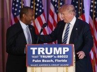 Republican presidential candidate Donald Trump stands with former presidential candidate Ben Carson as he receives his endorsement at the Mar-A-Lago Club on March 11, 2016 in Palm Beach, Florida.