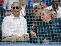 President Barack Obama (L) and Cuban President Raul Castro arrive for an exposition game between the Cuban national team and the Major League Baseball team Tampa Bay Devil Rays at the Estado Latinoamericano March 22, 2016 in Havana, Cuba.