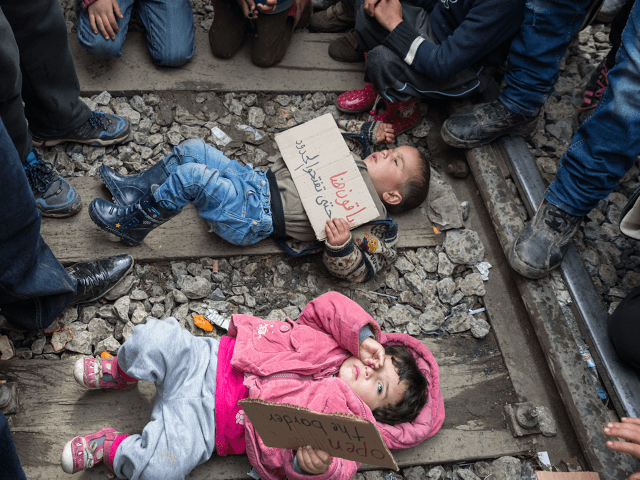 Migrant children train track Greece