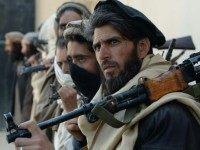 Afghan alleged former Taliban fighters hand over their weapons as part of a government peace and reconciliation process in Jalalabad on February 24, 2016