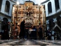 Christian worshippers queue to visit the Tomb of Christ, where according to Christian belief the body of Jesus was laid after his death, inside the Church of the Holy Sepulchre in the Jerusalem's Old City, on March 23, 2016.