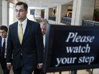 Bryan Pagliano, a former State Department employee who helped set up and maintain a private email server used by Hillary Rodham Clinton, departs Capitol Hill in Washington, Thursday, Sept. 10, 2015, to give his deposition to a House panel on the Benghazi investigation. Pagliano will assert his constitutional right not to testify before any congressional committees, his lawyer says. (AP Photo/Cliff Owen)