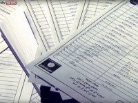 Documents identifying supporters of Islamic State are seen in this still image from video, released by Sky News to Reuters in London on March 10, 2016. REUTERS/SKY NEWS/HANDOUT VIA REUTERS