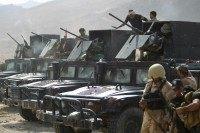 Iraqi security forces and Popular Mobilisation units, pictured in the Makhoul mountains during a military operation against Islamic State (IS) fighters in October 2015
