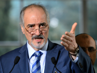 Ambassador to the United Nations and Head of the Government delegation Bashar al-Jaafari gestures during a press conference following a new round of negotiations of peace talks on Syria at the United Nations Office in Geneva on March 21, 2016.