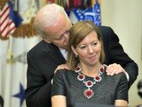 Biden Whispers to Ash Carter's Wife Evan Vucci AP