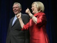 Democratic U.S. presidential hopeful  Hillary Clinton (R), Virginia Governor Terry McAuliffe June 26, 2015 in Fairfax, Virginia.