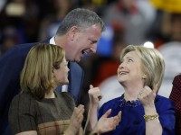 NEW YORK, NY - MARCH 2:  Democratic presidential candidate Hillary Clinton (R) speaks with New York City Mayor Bill de Blasio after speaking at a rally at the Javits Center on March 2, 2016 in New York City. The former secretary of state won seven states in yesterday's Super Tuesday.  (Photo by Eduardo Munoz Alvarez/Getty Images)