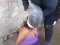 GRAPHIC: Mexican Authorities Use Trash Bags to Interrogate Suspected Female Cartel Member