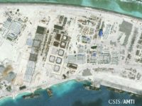 The northwest side of Mischief Reef showing a 1,900 foot seawall and newly-constructed infrastructure including housing, an artificial turf parade grounds, cement plants, and docking facilities are shown in this Center for Strategic and International Studies (CSIS) Asia... REUTERS/CSIS ASIA MARITIME TRANSPARENCY INITIATIVE/DIGITAL GLOBE/HANDOUT VIA REUTERS