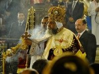 Leader of Egypt's Coptic Christians, Pope Tawadros II, (C) Head of the Egyptian Coptic Orthodox Church, leads the Coptic Christmas midnight mass at the al-Abasseya Cathedral in Cairo late on January 6, 2014.