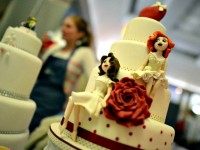 LEEDS, ENGLAND - MARCH 02 : A same sex wedding cake at the Gay Wedding Show at the Queens Hotel on  March 2, 2014 in Leeds, England. Legislation to allow same-sex marriage in England and Wales was passed by Parliament in July 2013 and will come into force on  March 23,2014, with the first same-sex marriages taking place on March 29, 2014.  (Photo by Nigel Roddis/Getty Images)