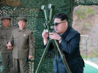DEMOCRATIC PEOPLE'S REPUBLIC OF KOREA : This picture released from North Korea's official Korean Central News Agency (KCNA) on April 24, 2016 shows North Korean leader Kim Jong-Un (R) inspecting an underwater test-fire of a strategic submarine ballistic missile at an undisclosed location in North Korea on April 23, 2016. North Korean leader Kim Jong-Un hailed a submarine-launched ballistic missile (SLBM) test as an "eye-opening success", state media said on April 24, declaring Pyongyang has the ability to strike Seoul and the US whenever it pleases. / AFP PHOTO / KCNA VIA KNS / KCNA