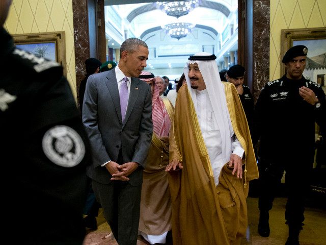 President Barack Obama and Saudi Arabia's King Salman walk together to a meeting at Erga Palace in Riyadh, Saudi Arabia, Wednesday, April 20, 2016. The president began a six day trip to strategize with his counterparts in Saudi Arabia, England and Germany on a broad range of issues with efforts to rein in the Islamic State group being the common denominator in all three stops. (AP Photo/Carolyn Kaster)