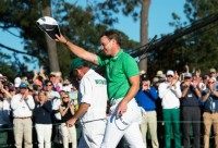 England's Danny Willett celebrates on the 18th green on April 10, 2016