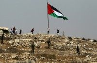 Israeli soldiers clash with Palestinian demonstrators during a demonstration against Jewish settlements in the occupied West Bank village of Nabi Saleh, near Ramallah, in September 2015