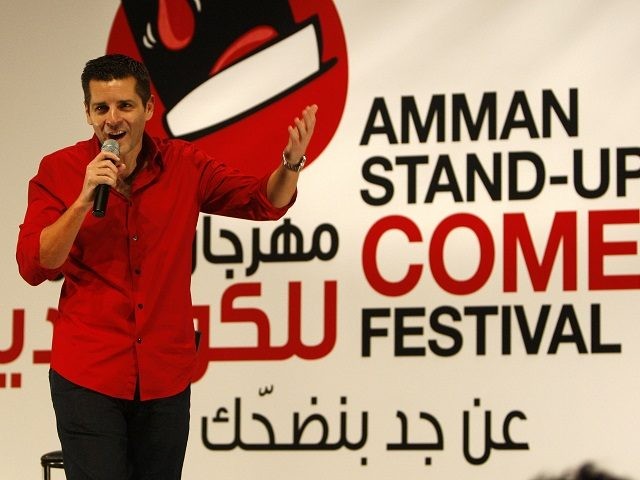 Dean Obeidallah an Arab-American/Italian-American producer and comedian performs at the Amman Stand-Up Comedy Festival in Amman-Jordan, Wednesday night Dec. 9, 2009.  (AP Photo/Mohammad Abu Ghosh)