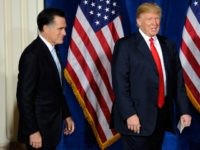 Mitt Romney (L) and Donald Trump arrive at a news conference held by Trump to endorse Romney for president February 2, 2012 in Las Vegas, Nevada.