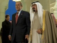George W. Bush and Saudi Arabia's King Abdullah bin Abdul Al Aziz al-Saud hold hands in Riyadh, Saudi Arabia 14 January 2008.