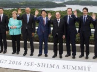 (From L) European Council President Donald Tusk, Italian Prime Minister Matteo Renzi, German Chancellor Angela Merkel, US President Barack Obama, Japanese Prime Minister Shinzo Abe, French President Francois Hollande, British Prime Minister David Cameron, Canadian Prime Minister Justin Trudeau and European Commission President Jean-Claude Juncker pose for the family photo during the first day of the Group of Seven (G7) summit meetings in Ise city on May 26, 2016.
World leaders kick off two days of G7 talks in Japan on May 26 with the creaky global economy, terrorism, refugees, China's controversial maritime claims, and a possible Brexit headlining their packed agenda. / AFP / AFP POOL / JIM WATSON        (Photo credit should read JIM WATSON/AFP/Getty Images)