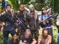 Video: Islamic State-Linked Filipino Terrorists Threaten to Behead 3 Hostages